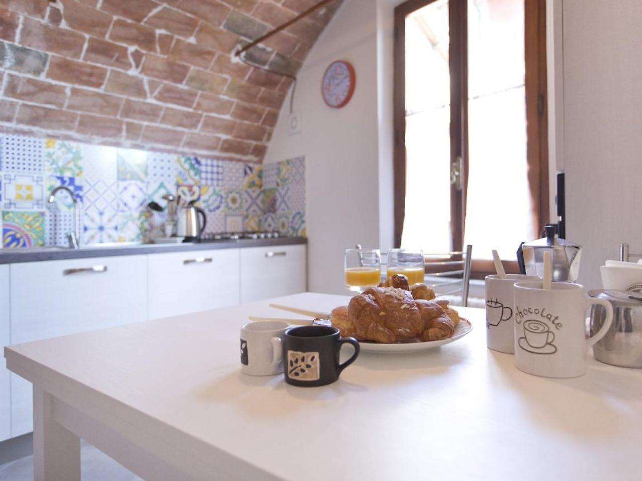 Nonna Pappa Apartment Siena Bagian luar foto