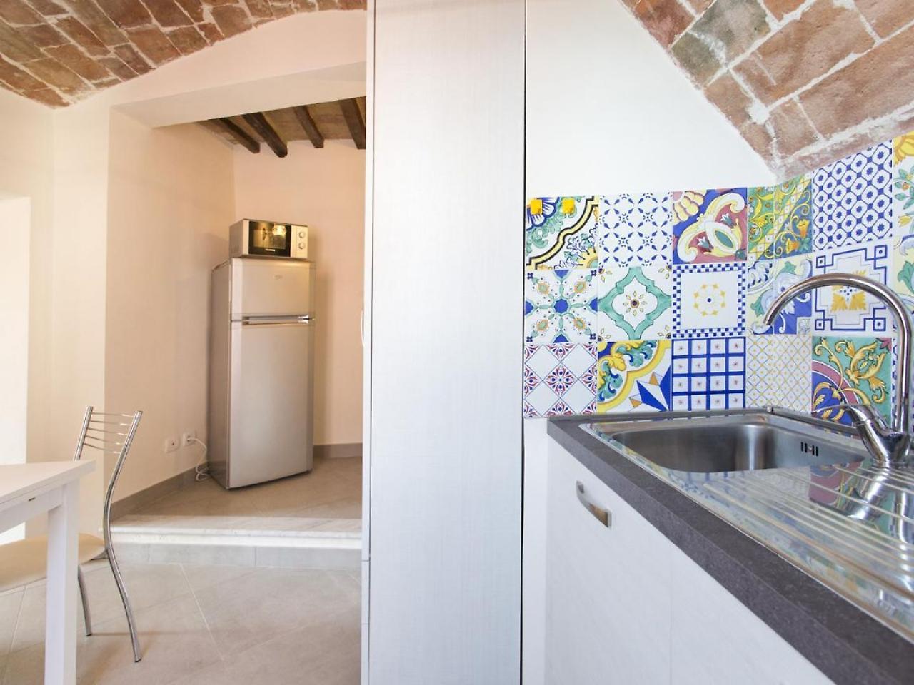 Nonna Pappa Apartment Siena Bagian luar foto