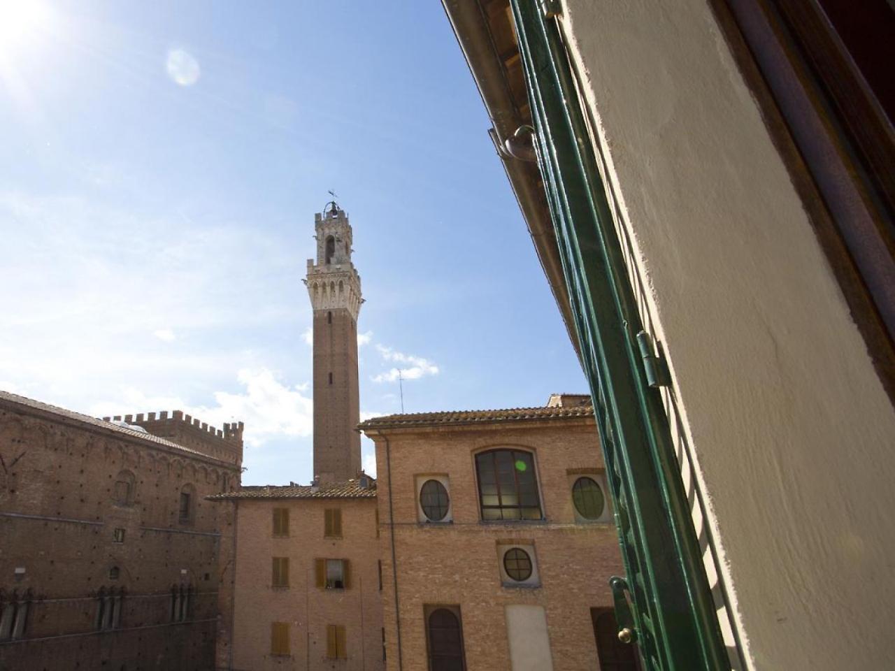 Nonna Pappa Apartment Siena Bagian luar foto